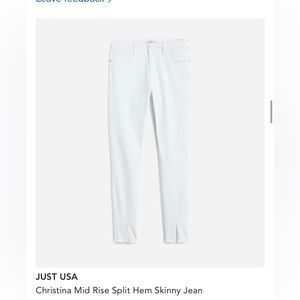 White skinny jeans with split hem on front